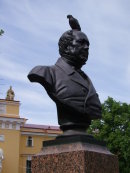 Bird perched on Bronze Bust, Admiralty Park, St Petersburg