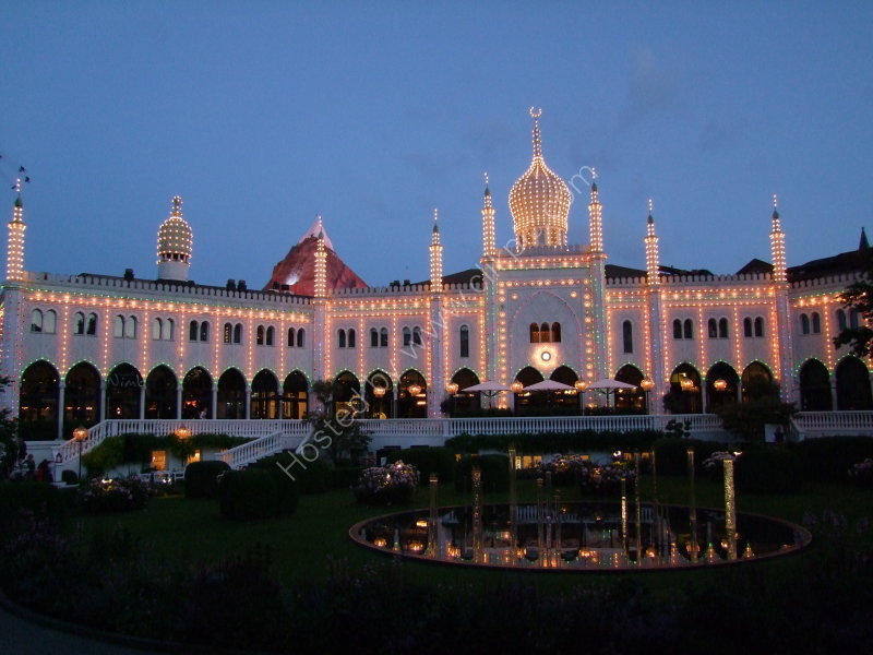 Asian Building & Fountain at Night