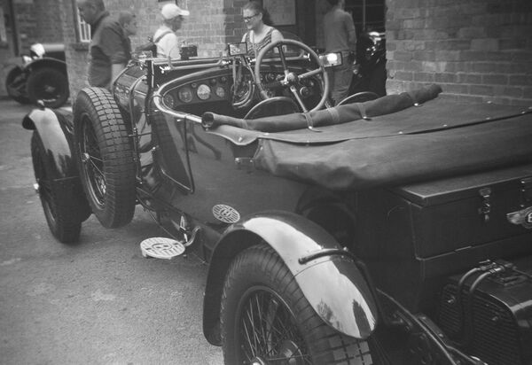 Bentley outside a workshop at Bicester Heritage
