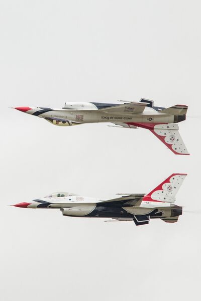 Two of the Thunderbirds display team fly in mirror formation
