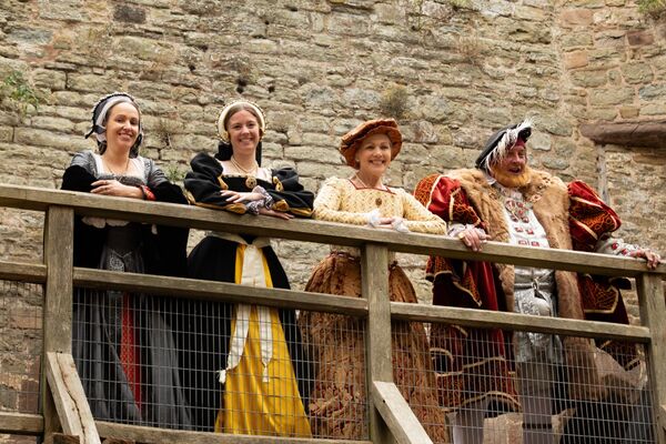 Henry VIII and three of his queens.