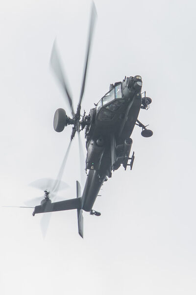 An Army Air Corps Apache banks hard over RNAS Yeovilton.