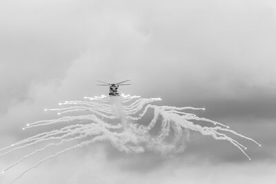 A Royal Navy Wildcat fires a spread of flares. A Royal Navy Wildcat releases flares at RNAS Yeovilton.