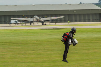 One of the Gravity Flyers passes the BBMF Lancaster.