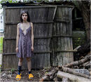 Liaison's behind the garden shed. Camille Alexander. Glyn Davies Portrait