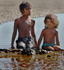 Making mud pies.