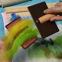 Carding merino wool fibres