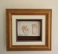 Framed hand and foot 2D Prints of a 7 week old baby