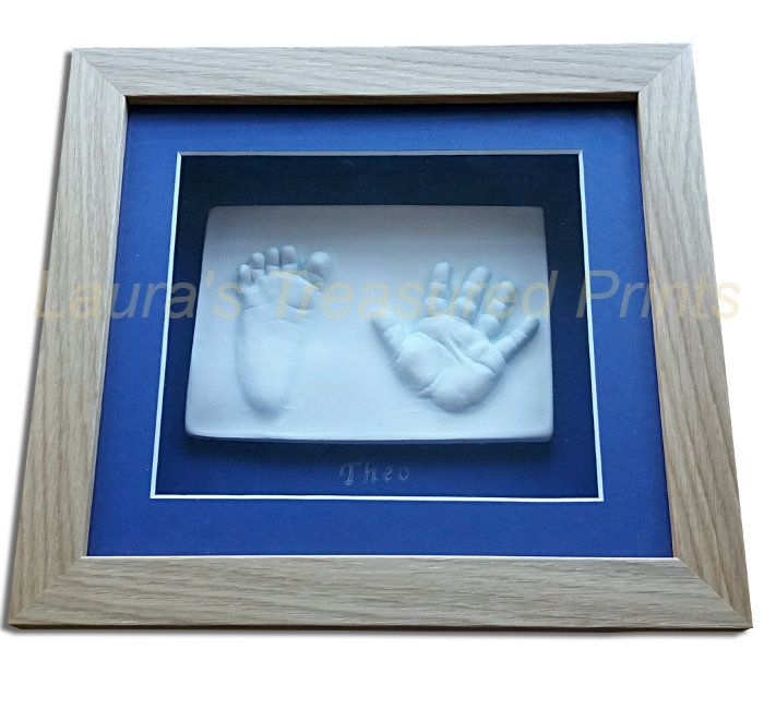 2D child's handprint & footprint plaque with blue mount and oak frame