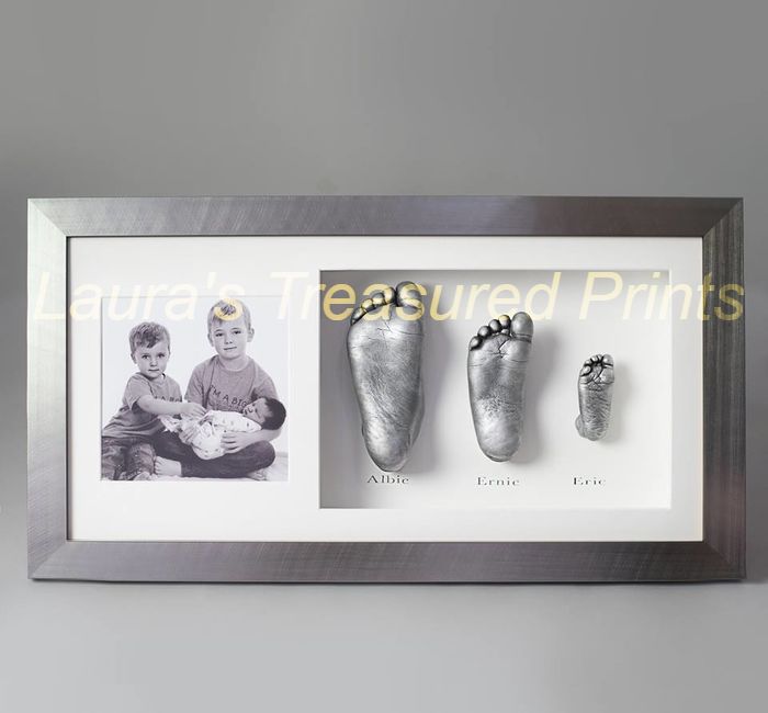 3D Foot casts of 3 brothers in silver frame