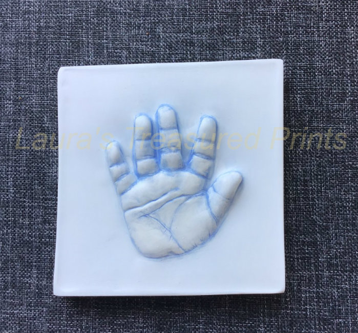 Child's hand-print plaque