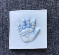 Child's hand-print plaque