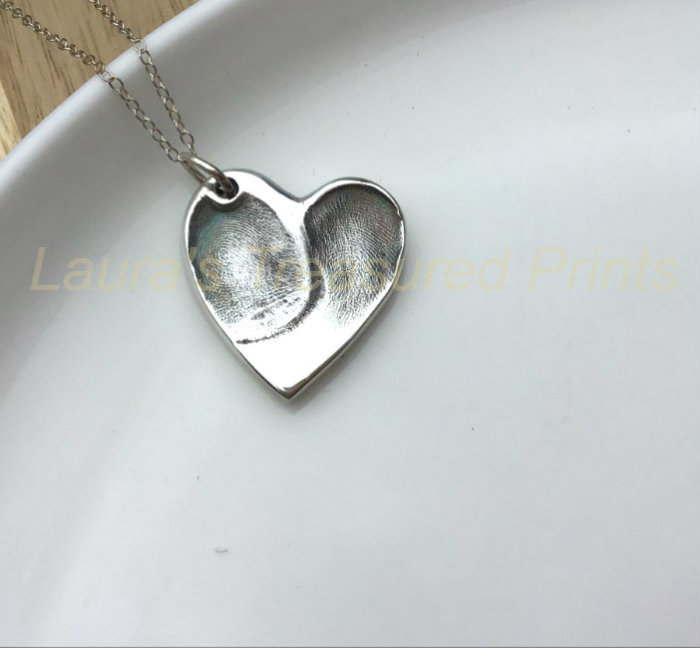 Foundry cast double fingerprint pendant
