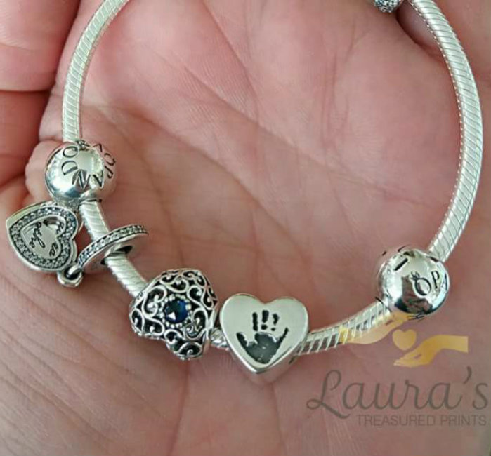 Handprint bead on bracelet