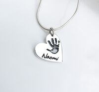 Beautiful heart handprint pendant