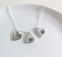 Heart hand- print pendants