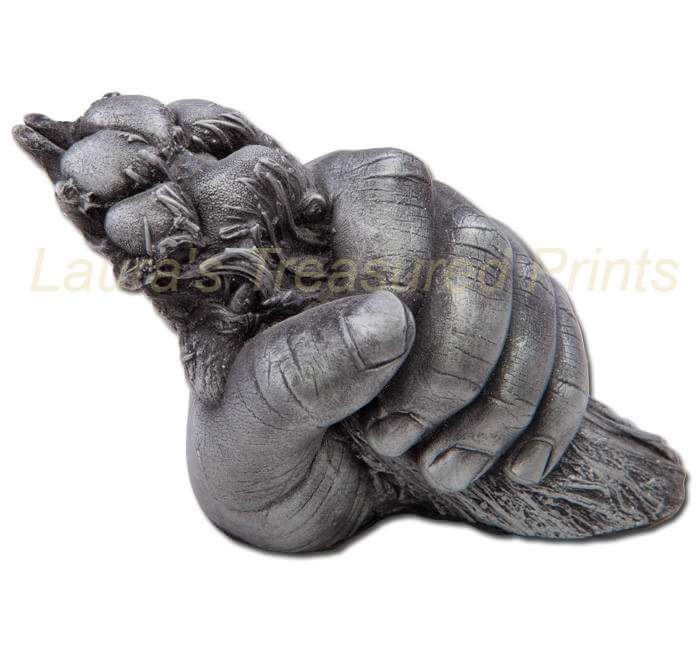 Child holding dog's paw!