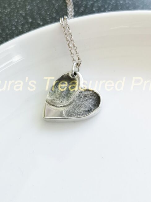 Foundry cast double fingerprint pendant