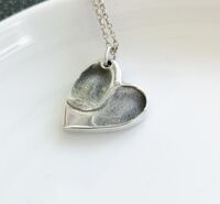 Foundry cast double fingerprint pendant