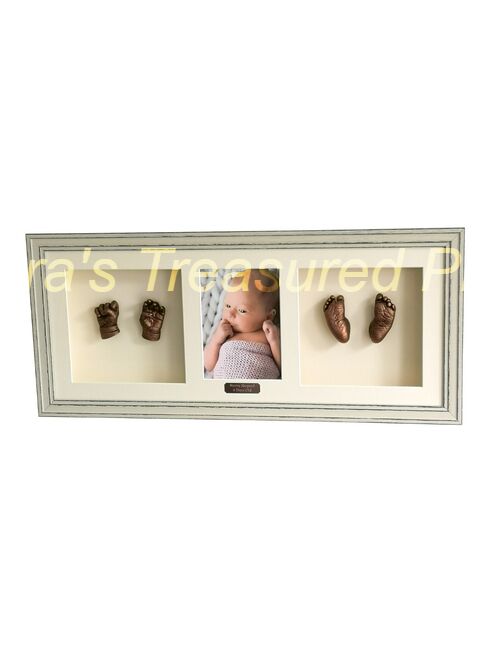 Full set of 3D baby casts in an oak frame.with photo