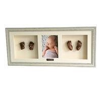 Full set of 3D baby casts in an oak frame.with photo