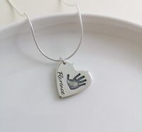 Foundry cast heart hand-print pendant