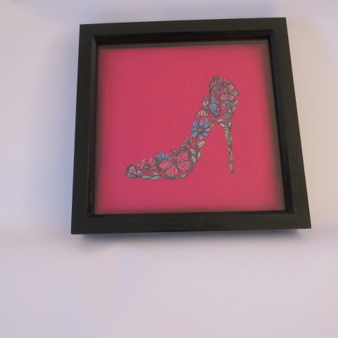 Shoe in a frame