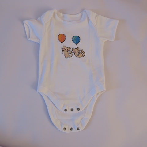 Embroidered baby grow with playful kittens