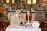 JOSIE AND MARK SIGNING THE REGISTER