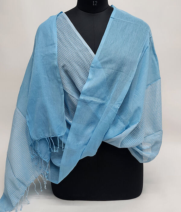 Fine lightweight, blue scarf draped on a mannequin