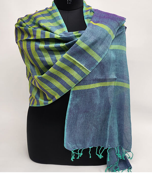 Blue and yellow handwoven scarf draped on a mannequin