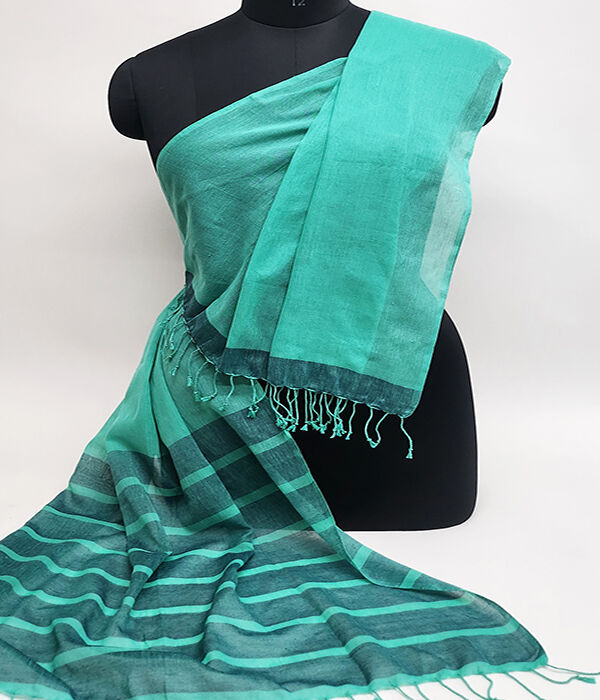 turquoise blue, fine cotton scarf draped on a mannequin