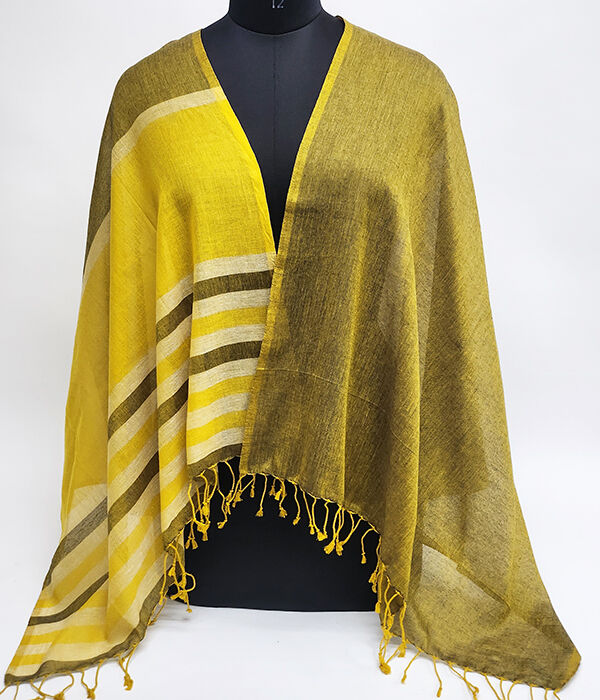 Ochre and brown fine cotton scarf draped across a mannequin