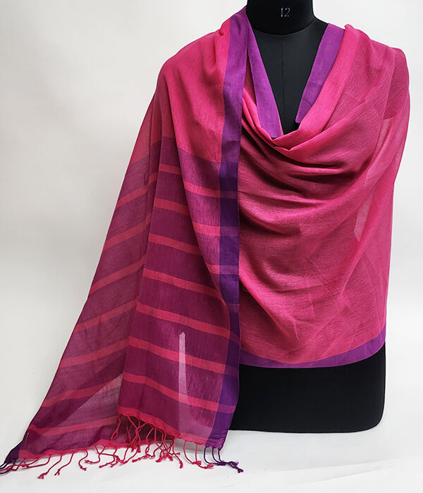 Fuschia pink fine cotton scarf draped on a mannequin