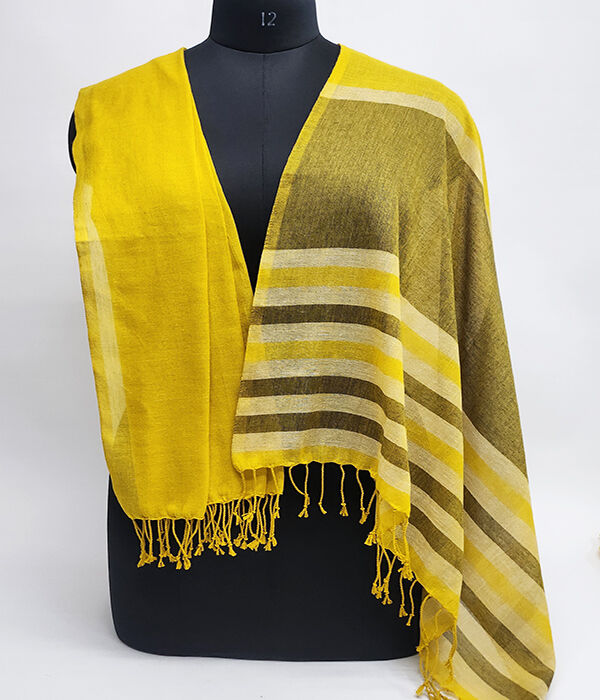 Ochre and brown fine cotton scarf draped across a mannequin