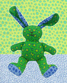Bethal Bunny Baby Brightly coloured cotton soft toy bunny with green patterned body and blue patterned ears.