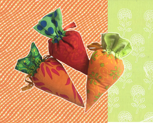 Three carrot shaped gift pouches made of printed cotton.