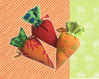 Carrot Easter Pouch Three carrot shaped gift pouches made of printed cotton.