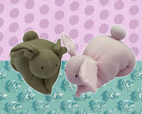 Cotton Knit bunnies One khaki coloured soft toy rabbit and one natural coloured soft toy rabbit