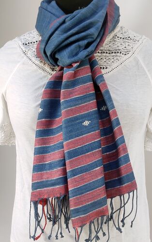 Red and blue scarf tied on a mannequin
