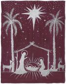 G-342022 Christmas Card Christmas card depicting a stable with Mary and Joseph and the baby in a manger. there are deer outside the stable and two palm trees either side and a big star overhead. The background is dark maroon