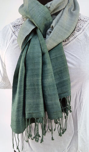 Green ombre silk scarf tied on a mannequin