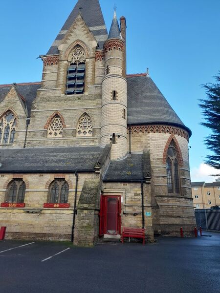It was originally a Church, as can be seen, probably victorian, serving the parish of Silvertown