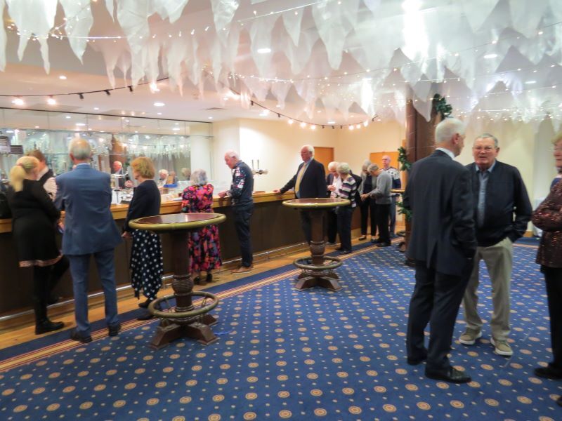 As members arrived, the bar started to get busy