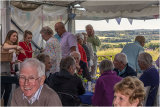 Peter and Annette Groves being served the delicious food