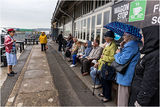 Trying to keep dry during the tour!