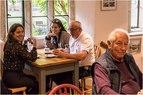 A welcome cup of tea and a piece of cake upon arrival at Broughton Castle