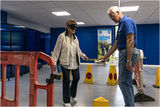 Being lead around the course by a "human guide-dog"