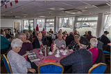 There were berets and onions on each table to set the scene