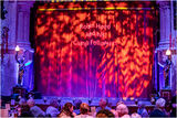 The stage curtains were closed, awaiting for the performance to start